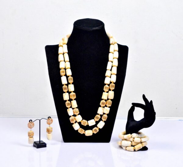 Tokunbo white coral beads for wife