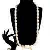 Ivie white coral bead